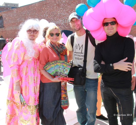 Artists, volunteers, and Natalie Burlutskaya of re:artiste