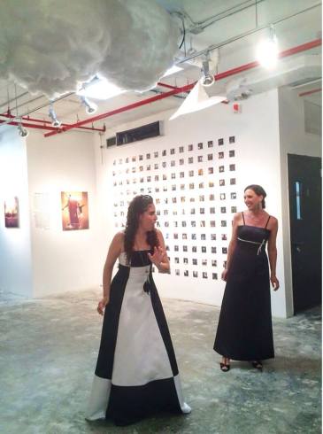 Opera singers performing *in the Rabbit Hole* - James Miille's photo show, "Life in the Rabbit Hole"