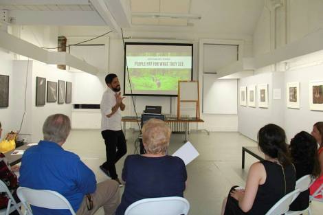 At the coaching session for artists: RE:ARTISTE with coach Leo Rapini and the artists at Soho Photo Gallery