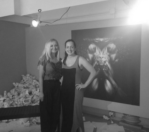Curator Natalie Burlutskaya (RE:ARTISTE) and artist and playwright, Brooke M. Haney; Art by Kate Goltseva
